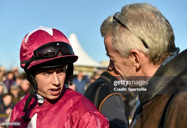 February 2015; Jockey Bryan Cooper speaking with Michael O'Leary, CEO of Ryanair and owner of Petite Parisienne after winning the Gala Retail Spring...