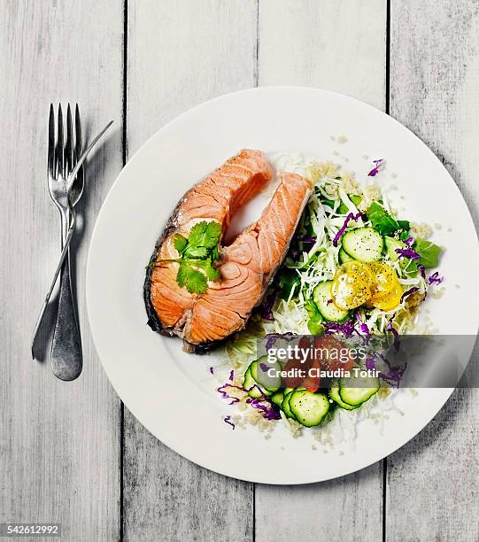 salmon steak with salad - healthy dishes no people stock pictures, royalty-free photos & images