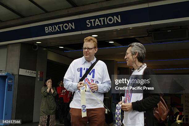 Two activists from the Britain Stronger in Europe campaign canvass outside Brixton Station. Millions of Britons are called to the ballot boxes, to...