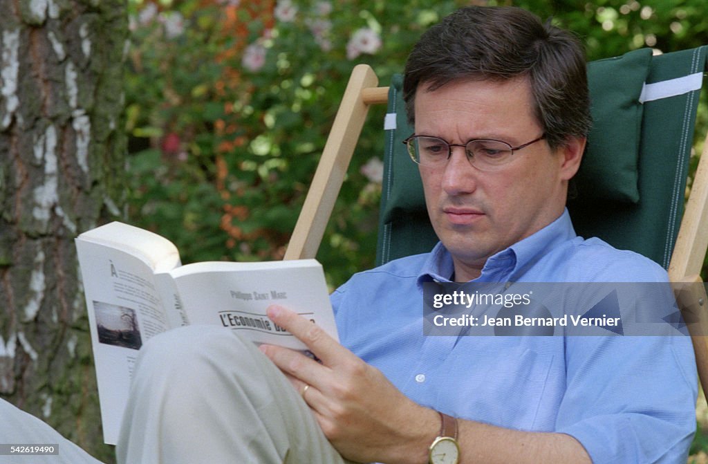 Politician Nicolas Dupont-Aignan Reading