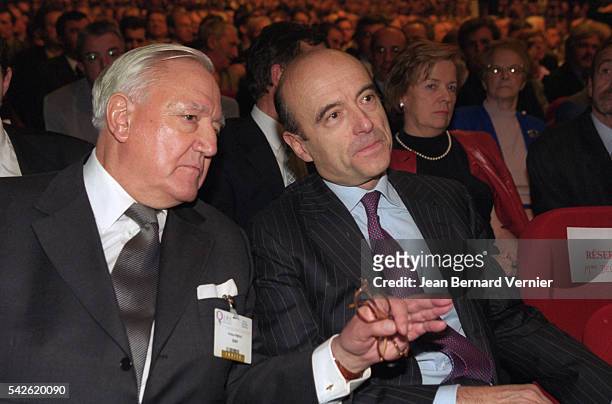 Senator Christian Poncelet and Alain Juppe, mayor of Bordeaux and former Prime Minister, attend the 2001 Congres des Maires in Paris. The annual...