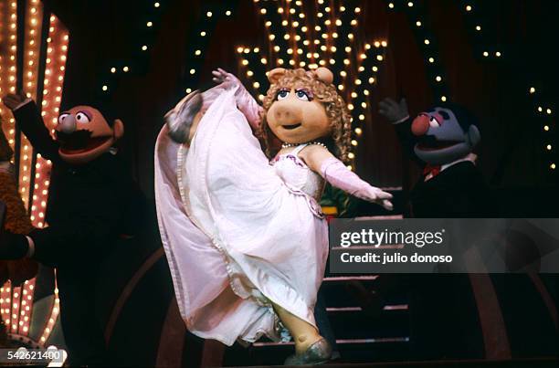 Jim Henson's Muppets visit London during The Muppet Show on Tour in 1987. Miss Piggy dances on stage.