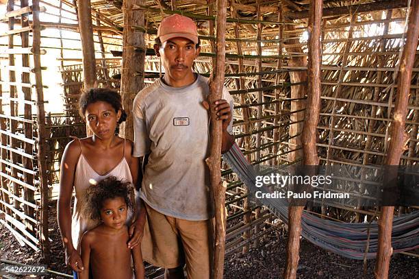 Antonio Francisco de Abreu his wife Fernanda Maria dos Santos and their daughter Jessiane inside of the house they are bulding at Parque Eliana, a...