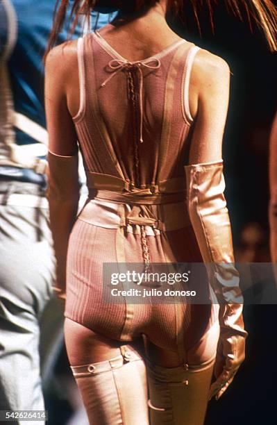 French designer house Jean Paul Gaultier shows its 1992 women's ready-to-wear Spring-Summer line in Paris. The model is wearing long gloves with a...