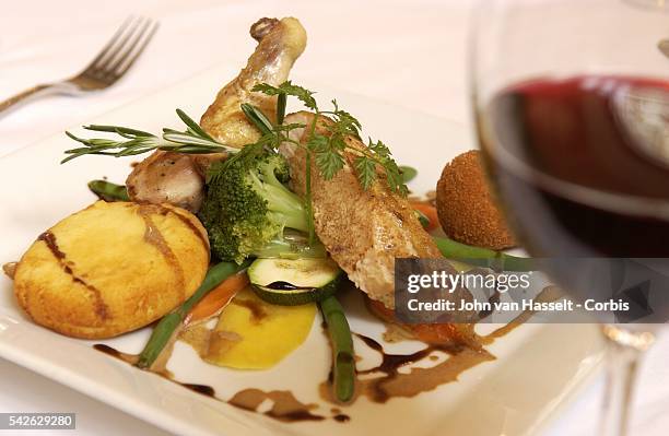 Traditional chicken recipe from the 17th and 18th century with a glass of Blauer Zweigelt red wine .In the stylish atmosphere of the historic Baroque...