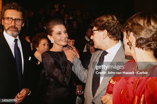 Audrey Hepburn and Yves Saint Laurent attend an exhibition at the Galliera Museum to celebrate the 40 years of fashion house Givenchy.