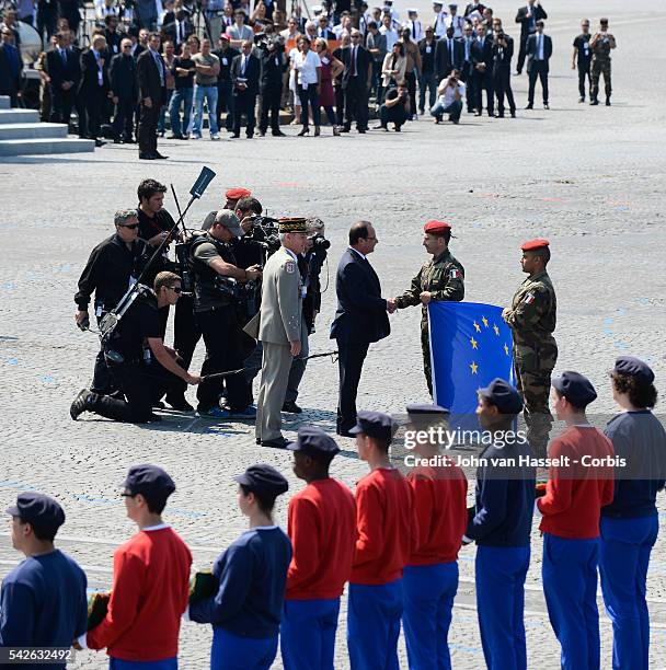 Bastille Day is celebrated in Paris as thousands of soldiers march down the Champs-Elysees on to Place Concorde in a celebrated annual tribute to...