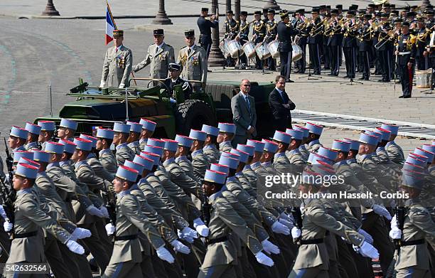 Bastille Day is celebrated in Paris as thousands of soldiers march down the Champs-Elysees on to Place Concorde in a celebrated annual tribute to...