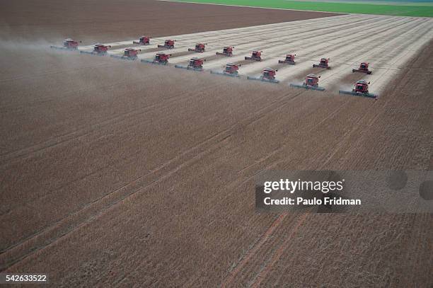 Combines to harvest soybeans sit at the Morro Azul farm about 70km from Tangara da Serra , Mato Grosso, Brazil , on Tuesday,March 27th, 2012.