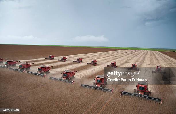 Combines to harvest soybeans sit at the Morro Azul farm about 70km from Tangara da Serra , Mato Grosso, Brazil , on Tuesday,March 27th, 2012.