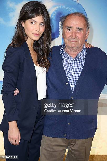 Actress Leslie Medina and Actor Claude Brasseur attend the 'Camping 3' Paris Premiere at Gaumont Champs Elysees on June 23, 2016 in Paris, France.