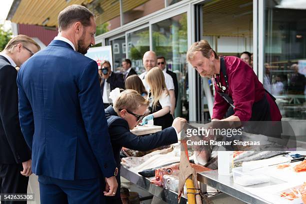 Crown Prince Haakon of Norway and Prince Sverre Magnus of Norway attend festivities at the Ravnakloa fish market during the Royal Silver Jubilee Tour...