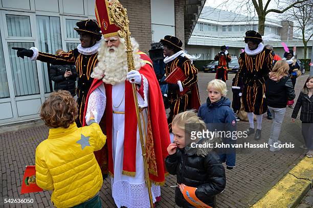 Centuries old tradition from which Santa Claus is derived, Sinterklaas or Saint Nicholas, a bishop and patron saint of children arrives in the...