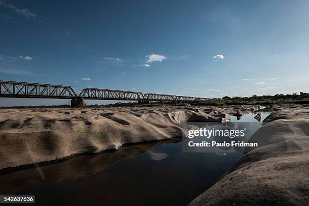 View of the drought at the Sao Francisco river with the bridge on the background. Pirapora, Minas Gerais, Brazil, October 11th 2014.