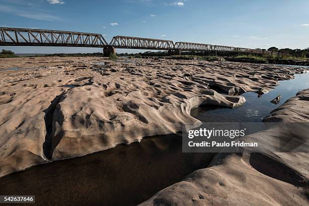 View of the drought at the Sao Francisco river with the bridge on the background. Pirapora, Minas Gerais, Brazil, October 11th 2014.