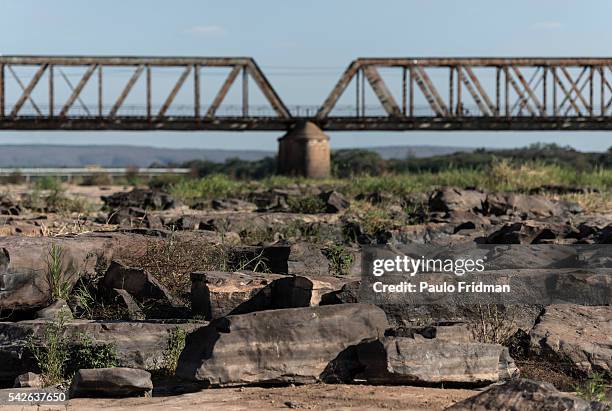 View of the drought at the Sao Francisco's river with the bridge on the background. Pirapora, Minas Gerais, Brazil, October 11th 2014.