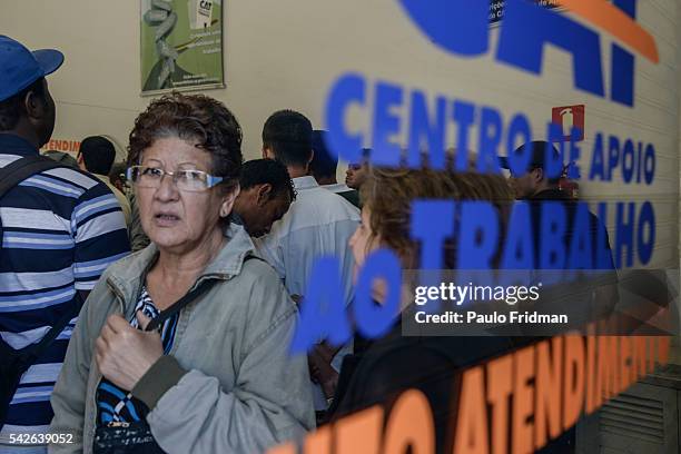 People wait in line to be served at CCAT Centro de Apoio ao Trabalho, Sao Paulo, Brazil on August 31st, 2015