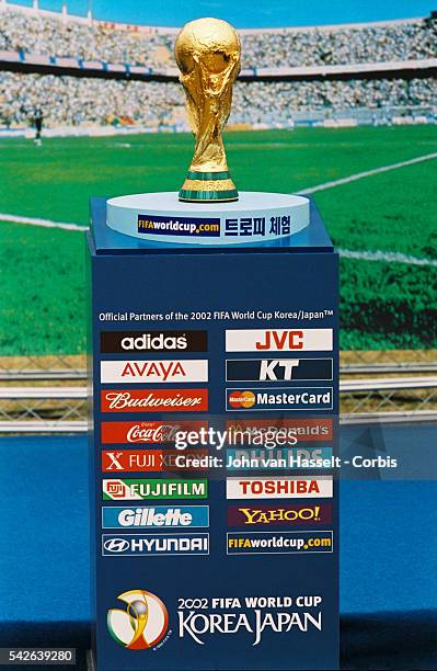 The world cup trophy made of 18 carat was created in 1978 by Italian sculptor Silvio Gazzaniga and is 36 cm tall and weighs 5 kg.