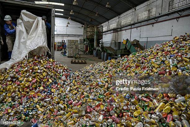 Aluminum cans are unloaded from a truck at at Centro de Coleta – Latasa Reciclagem S.A., Pindamonhangaba, State of Sao Paulo, Brazil ,on Wednesday,...