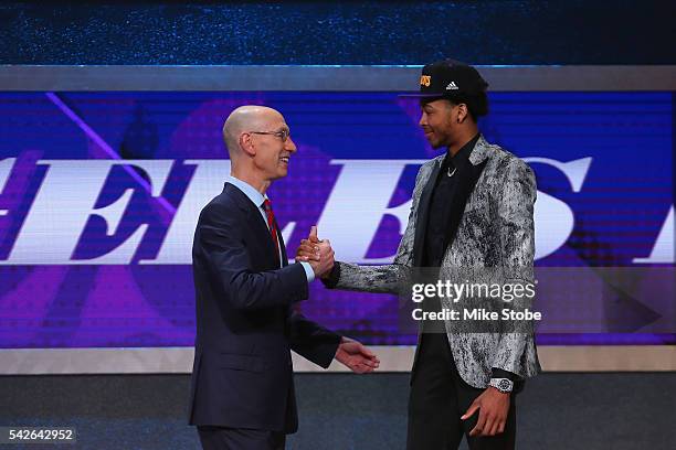 Brandon Ingram shakes hands with Commissioner Adam Silver after being drafted second overall by the Los Angeles Lakers in the first round of the 2016...