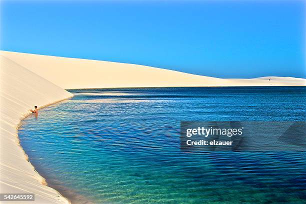 the boy and the lagoon - barreirinhas stock pictures, royalty-free photos & images