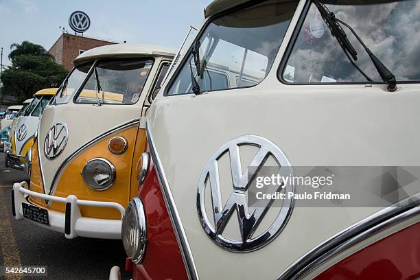 Campervans sit at an exhibition at the parking lot of the Volkswagen plant , Sao Bernardo do Campo, Brazil just before the end of the production in...