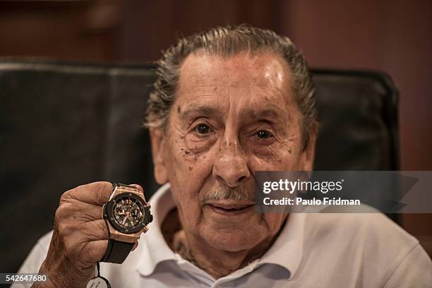 Alcides Edgardo GHIGGIA know for the goal that gave Uruguay the soccer championship in 1950 Brazil showing the watch that was given to him a s a gift...