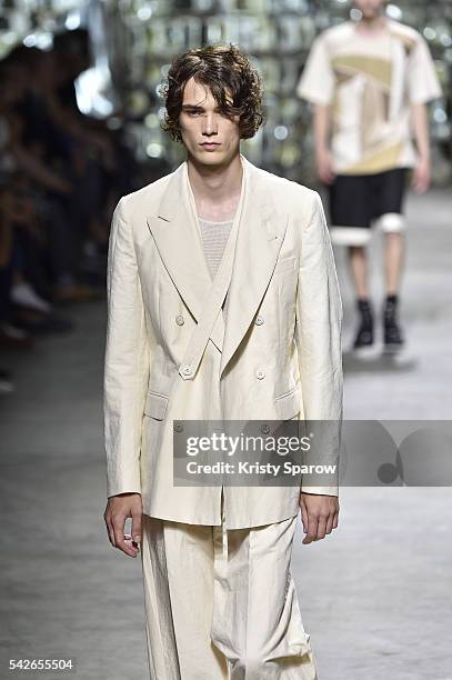 Model walks the runway during the Dries Van Noten Menswear Spring/Summer 2017 show as part of Paris Fashion Week on June 23, 2016 in Paris, France.