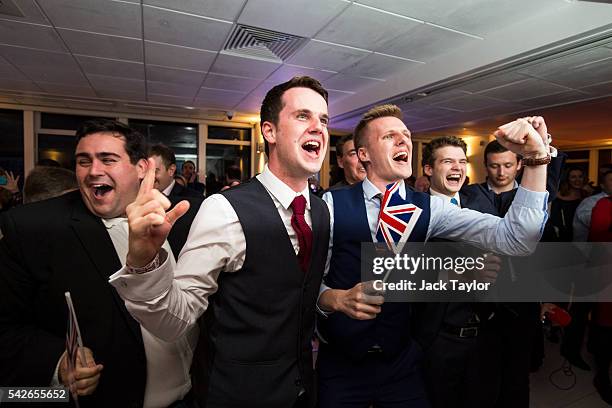 People react to a regional EU referendum result at the Leave.EU campaign's referendum party at Millbank Tower on June 23, 2016 in London, England....