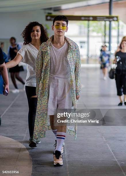 South Korean singer Kim Ki-bum Key outside Issey Miyake during the Paris Fashion Week Menswear Spring/Summer 2017 on June 23, 2016 in Paris, France.