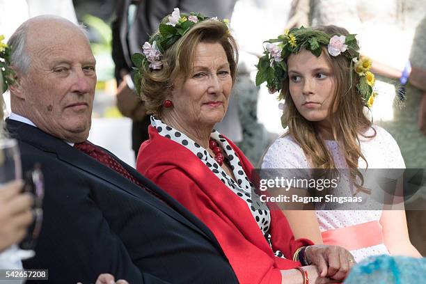 King Harald V of Norway, Queen Sonja of Norway and Princess Ingrid Alexandra of Norway attend a garden party during the Royal Silver Jubilee Tour on...