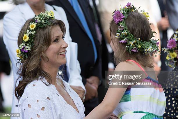 Princess Martha Louise of Norway and Emma Tallulah Behn attend a garden party during the Royal Silver Jubilee Tour on June 23, 2016 in Trondheim,...