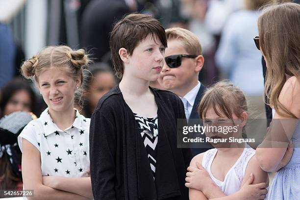 Leah Isadora Behn, Maud Angelica Behn and Emma Tallulah Behn attend festivities at the Ravnakloa fish market during the Royal Silver Jubilee Tour on...