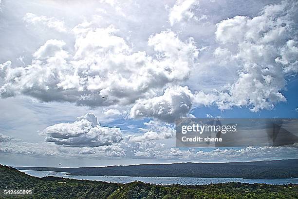 cloudscape over the lake taal - tagaytay stock pictures, royalty-free photos & images