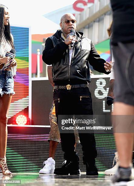 Recording artist Birdman speaks onstage during 106 & Park Live sponsored by Denny's & M&M's during the 2016 BET Experience at Microsoft Square on...