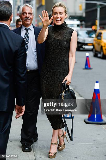 Actress Taylor Schilling enters "The Late Show With Stephen Colbert" taping at the Ed Sullivan Theater on June 23, 2016 in New York City.