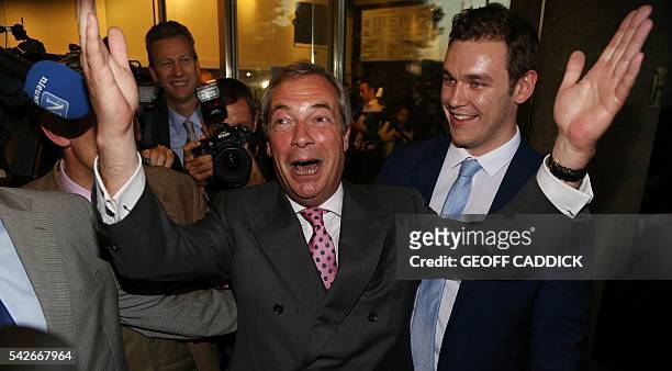 Leader of the United Kingdom Independence Party , Nigel Farage reacts outside the Leave.EU referendum party at Millbank Tower in central London on...