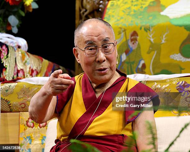 His Holiness the 14th Dalai Lama speaks during A Teaching: The Eight Verses of Training the Mind hosted by the Tibetan Association of Colorado at...