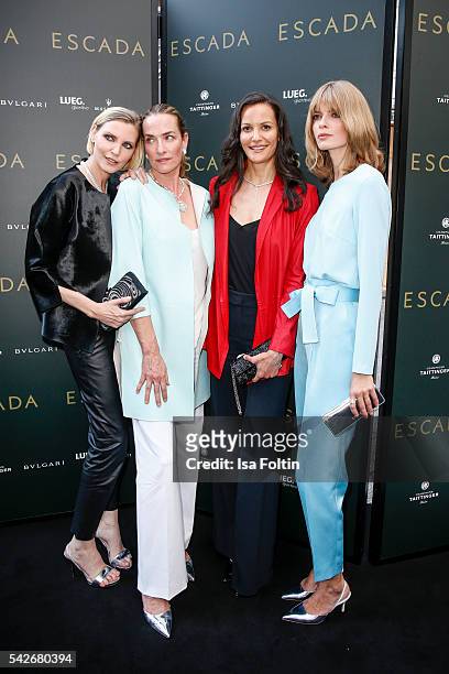 German model Nadja Auermann, German Model Tatjana Patitz, US Model Claudia Mason and German Model Julia Stegner attend the ESCADA Flagship Store...