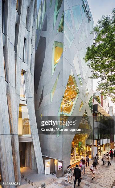 omotesando, hugo boss building and tod's building - omotesando tokyo stock pictures, royalty-free photos & images