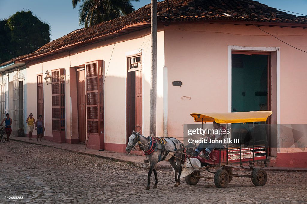 Horsecart on cobblestone street