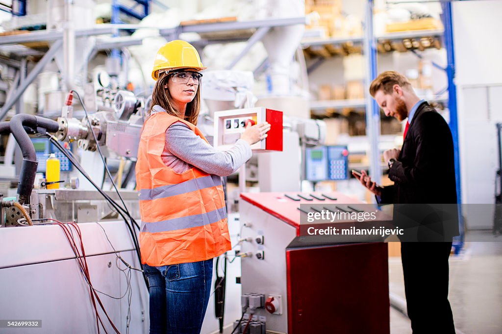 Woman Quality Control Female Worker With Quality Control Inspector In The Factory High-Res ...