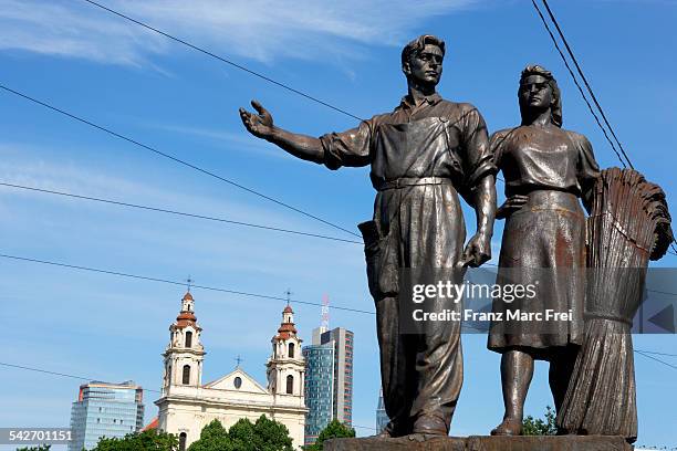 soviet statues and st raphael the archangel church - archange raphael stock pictures, royalty-free photos & images