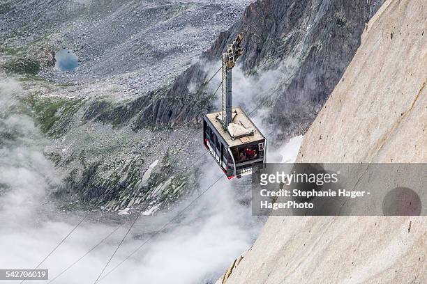 cable car on mountainside - aiguille du midi stock pictures, royalty-free photos & images