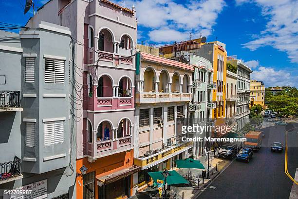 typical colourful buildings in recinto sur street - san juan puerto rico fotografías e imágenes de stock