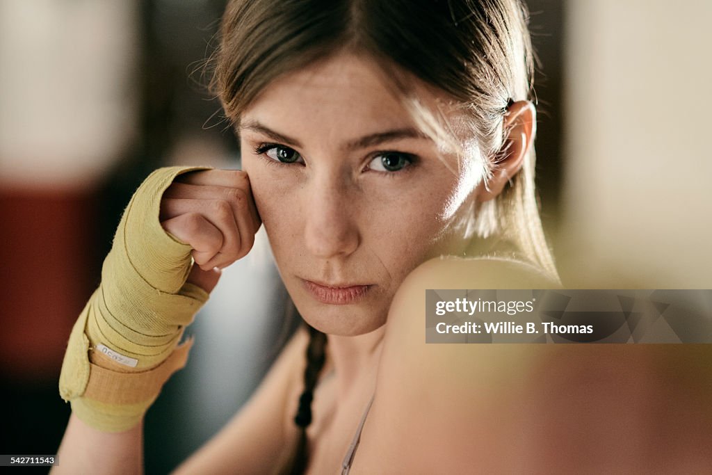 Portrait of woman in fighting stance