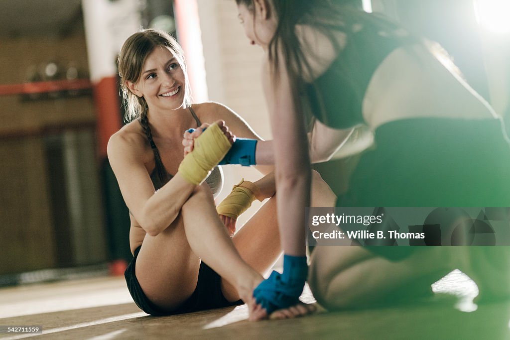 Female boxers shaking hands
