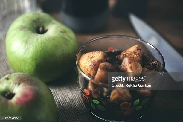 pot of stewed apples - rekha garton stock pictures, royalty-free photos & images