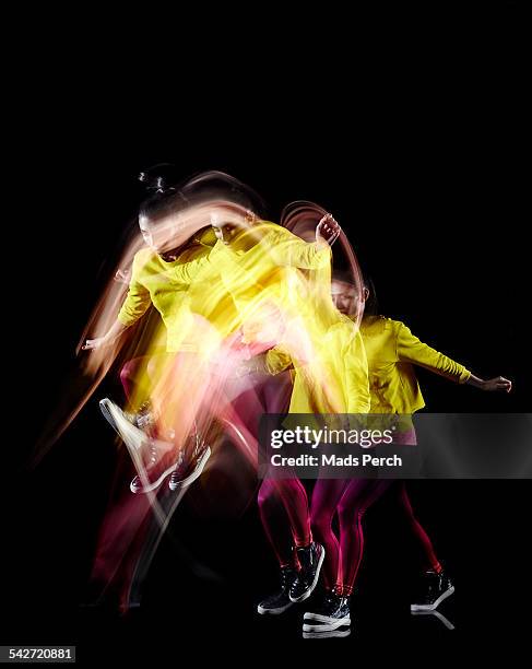 girl jumping - multiple exposure movement stock pictures, royalty-free photos & images