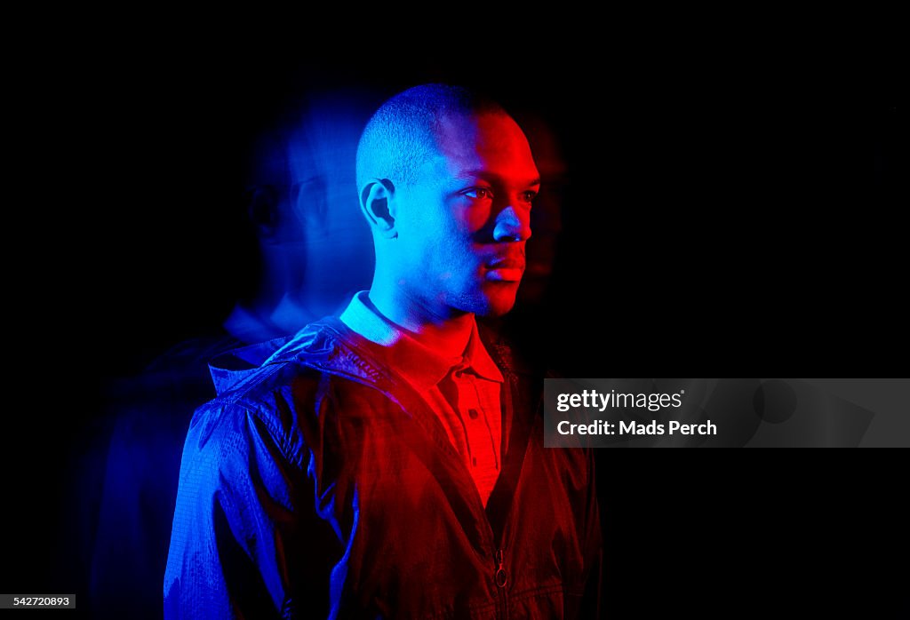 Young man photographed with creative lighting